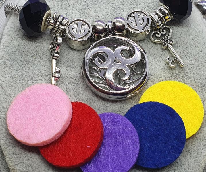 Triskele Perfume Holder Necklace with Charms