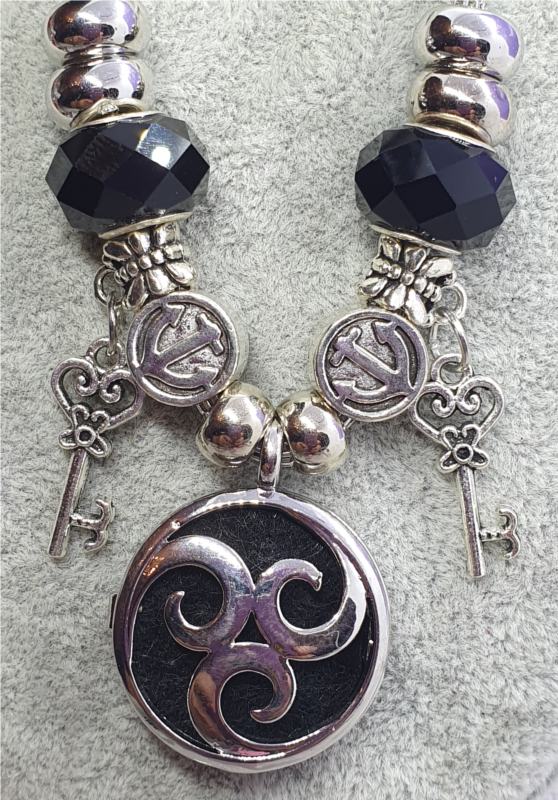 Triskele Perfume Holder Necklace with Charms